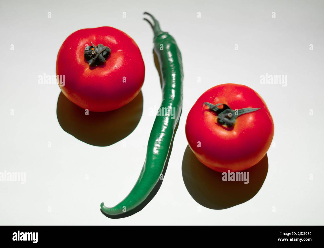 Deux tomates et un poivron Banque D'Images