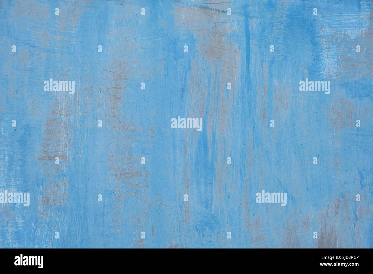 L'arrière-plan est une tôle de métal peinte avec de la vieille peinture bleue qui s'écaille Banque D'Images