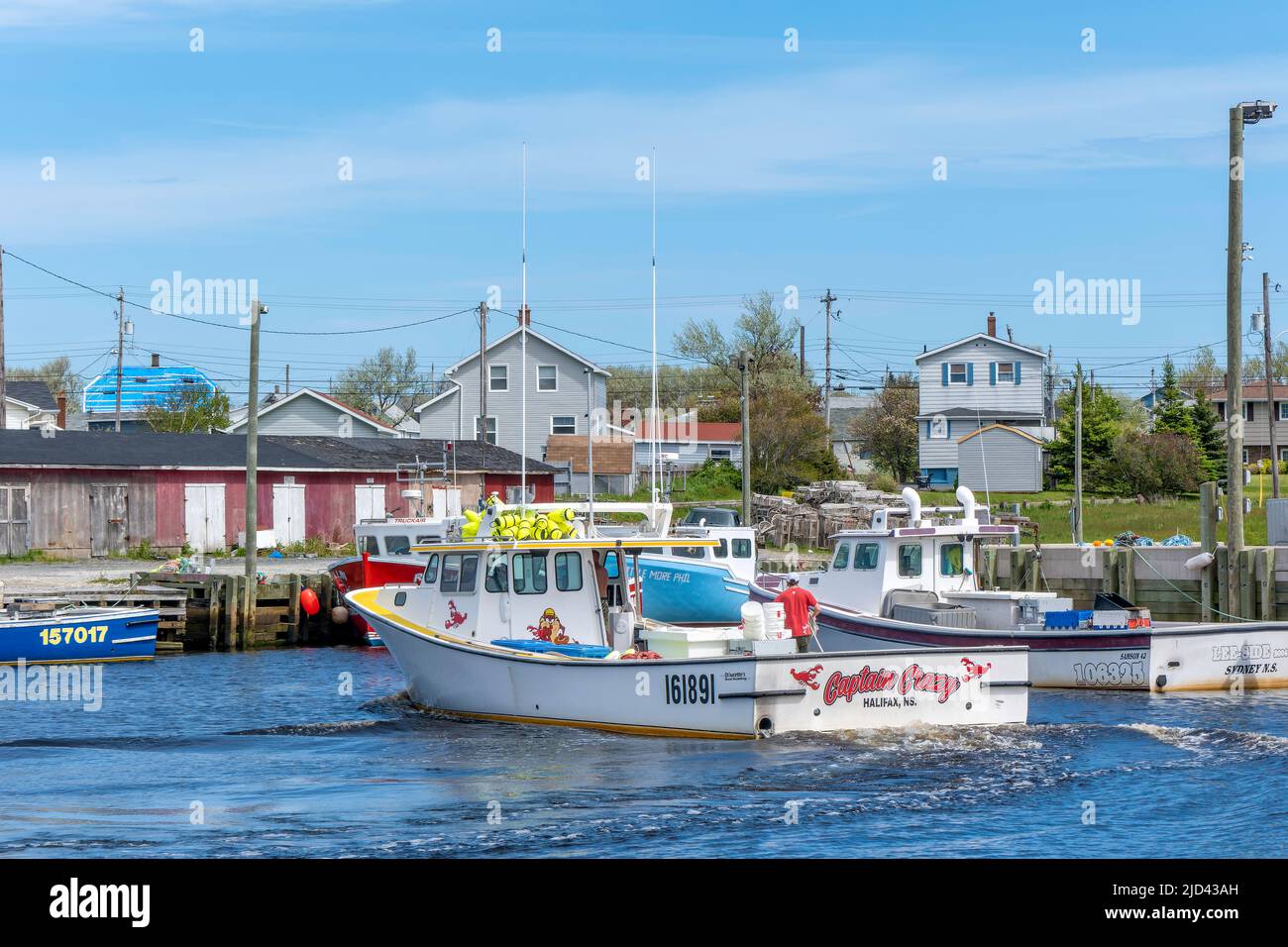 Le bateau de homard retourne au port de glace Bay, au Cap-Breton, en Nouvelle-Écosse. La pêche au homard est très importante pour l'économie de la région. Banque D'Images