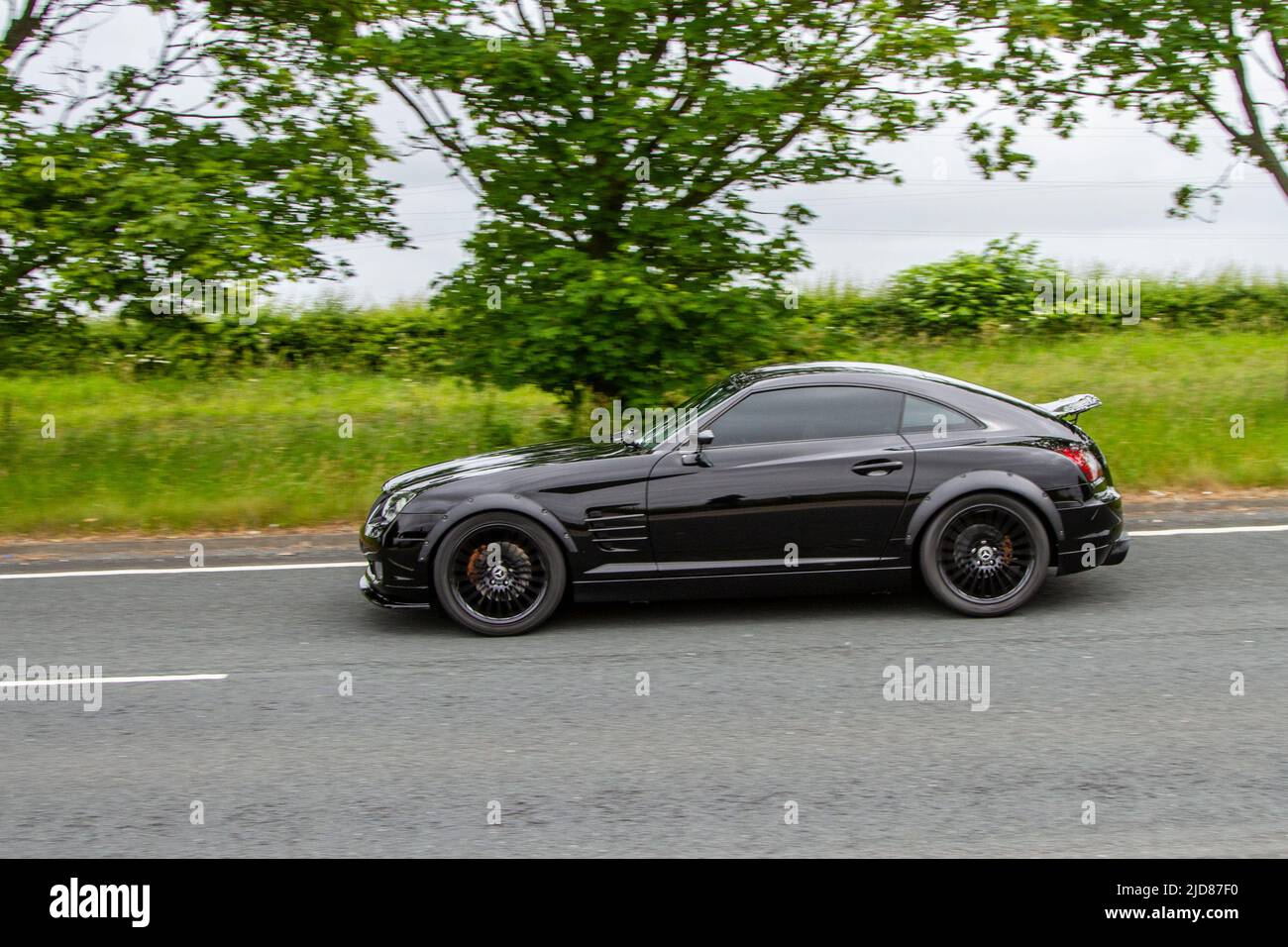 2006 Noir CHRYSLER CROSSFIRE V6 3199cc essence automatique à 5 vitesses; classique, moderne, classique, supercars et véhicules spécialisés en route vers Lytham St Annes, Lancashire, Royaume-Uni Banque D'Images