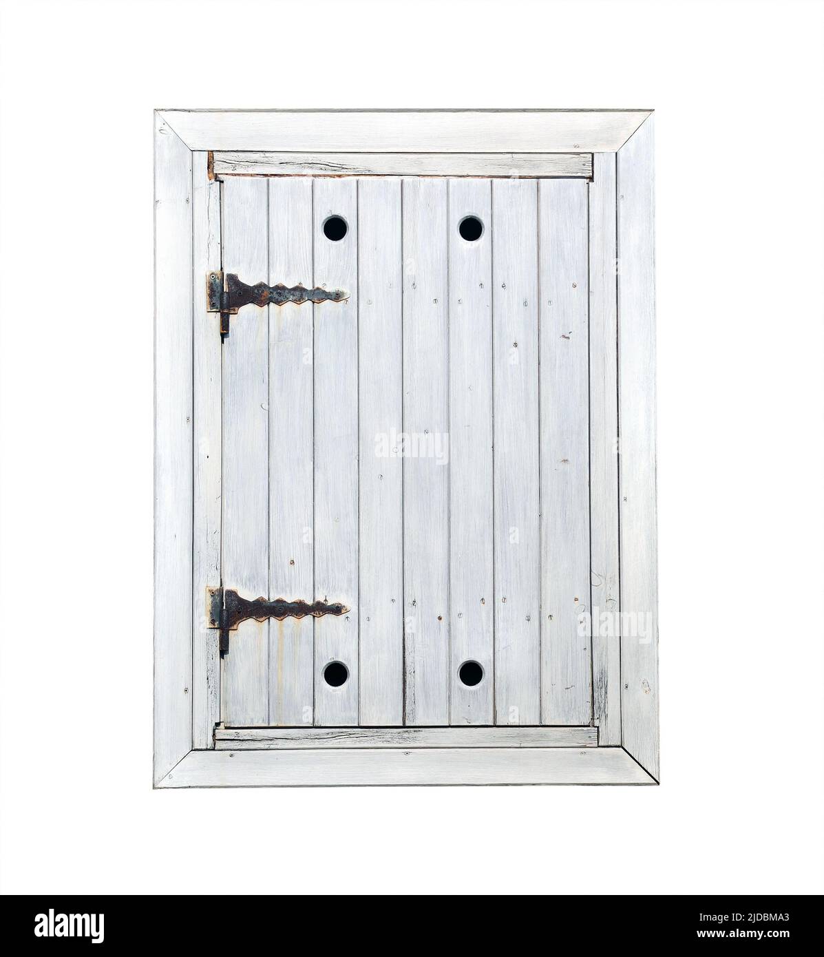 Volet ancien en bois peint fermé avec détails décoratifs. Volet de