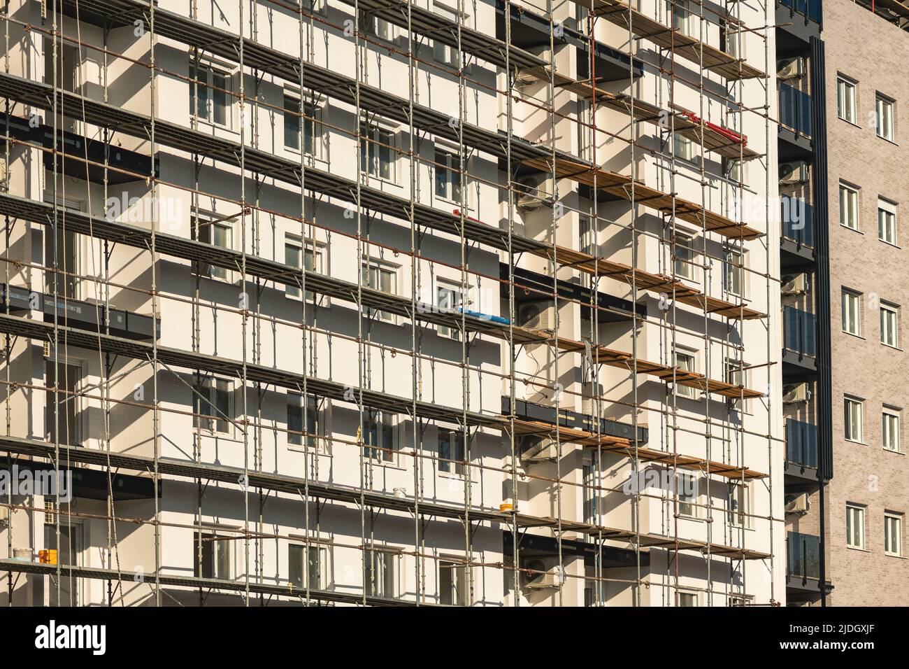 Aménagement immobilier, construction résidentielle d'appartements avec échafaudage Banque D'Images