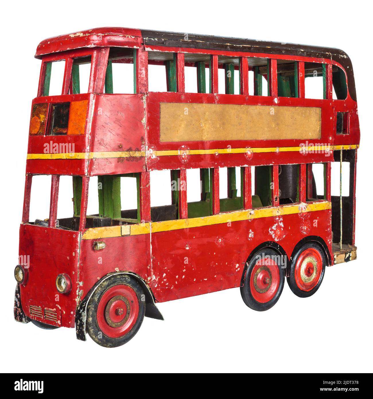 Vintage rouge anglais London bus jouet isolé sur un fond blanc Banque D'Images