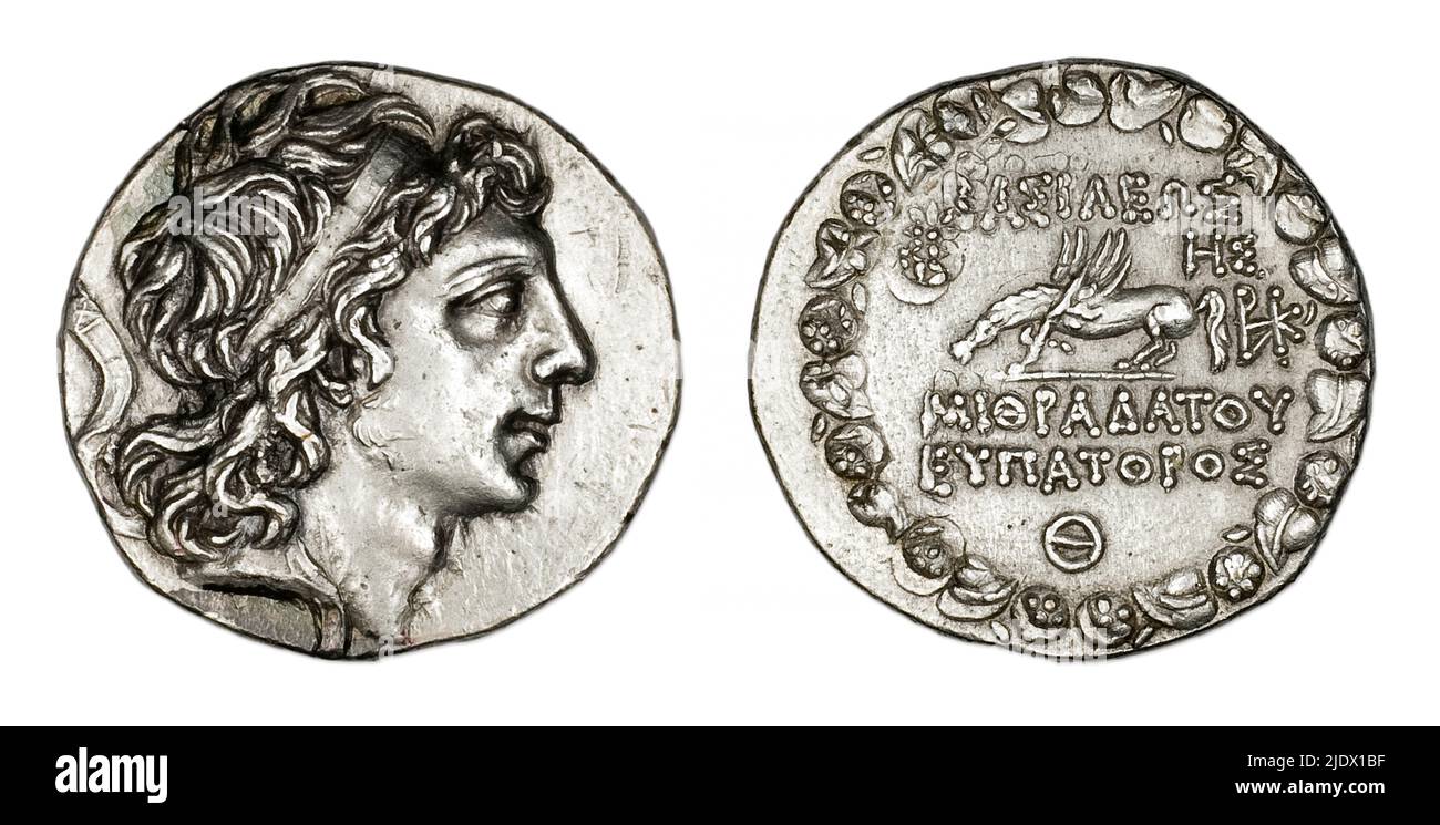 Pièce de monnaie grecque ancienne datant de 90BC montrant la tête du roi Mithradates VI (120-63BC) roi et le cheval ailé Pegasus au dos. Banque D'Images