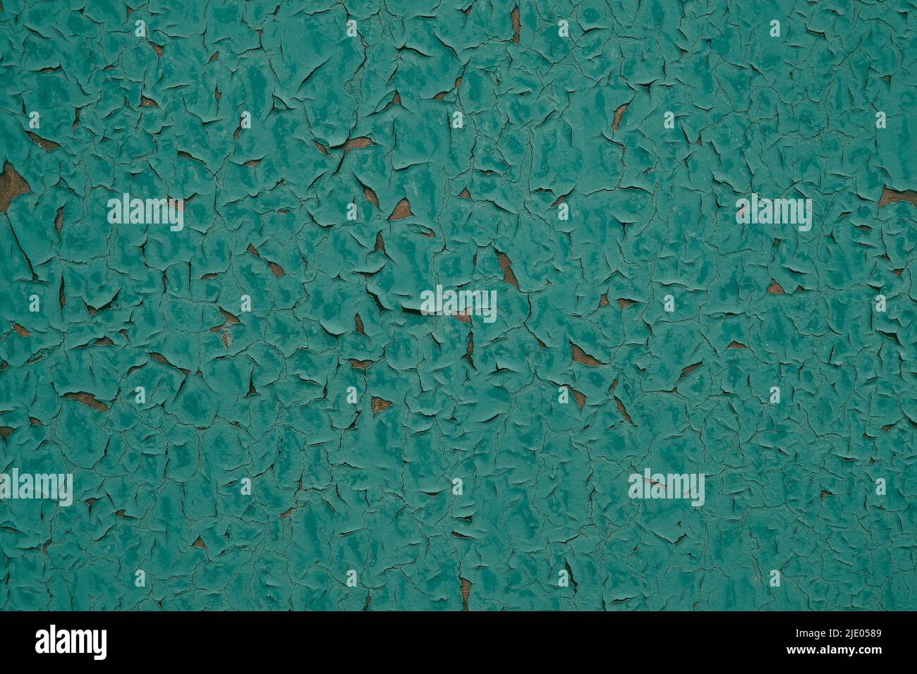 Arrière-plan abstrait peeling peinture verte sur le mur Banque D'Images