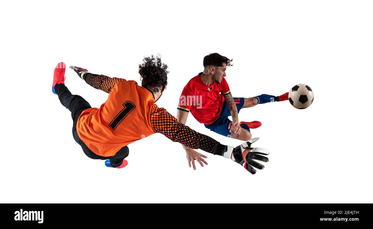 Gardien attrape la balle dans le stade au cours d'un match de football. Banque D'Images