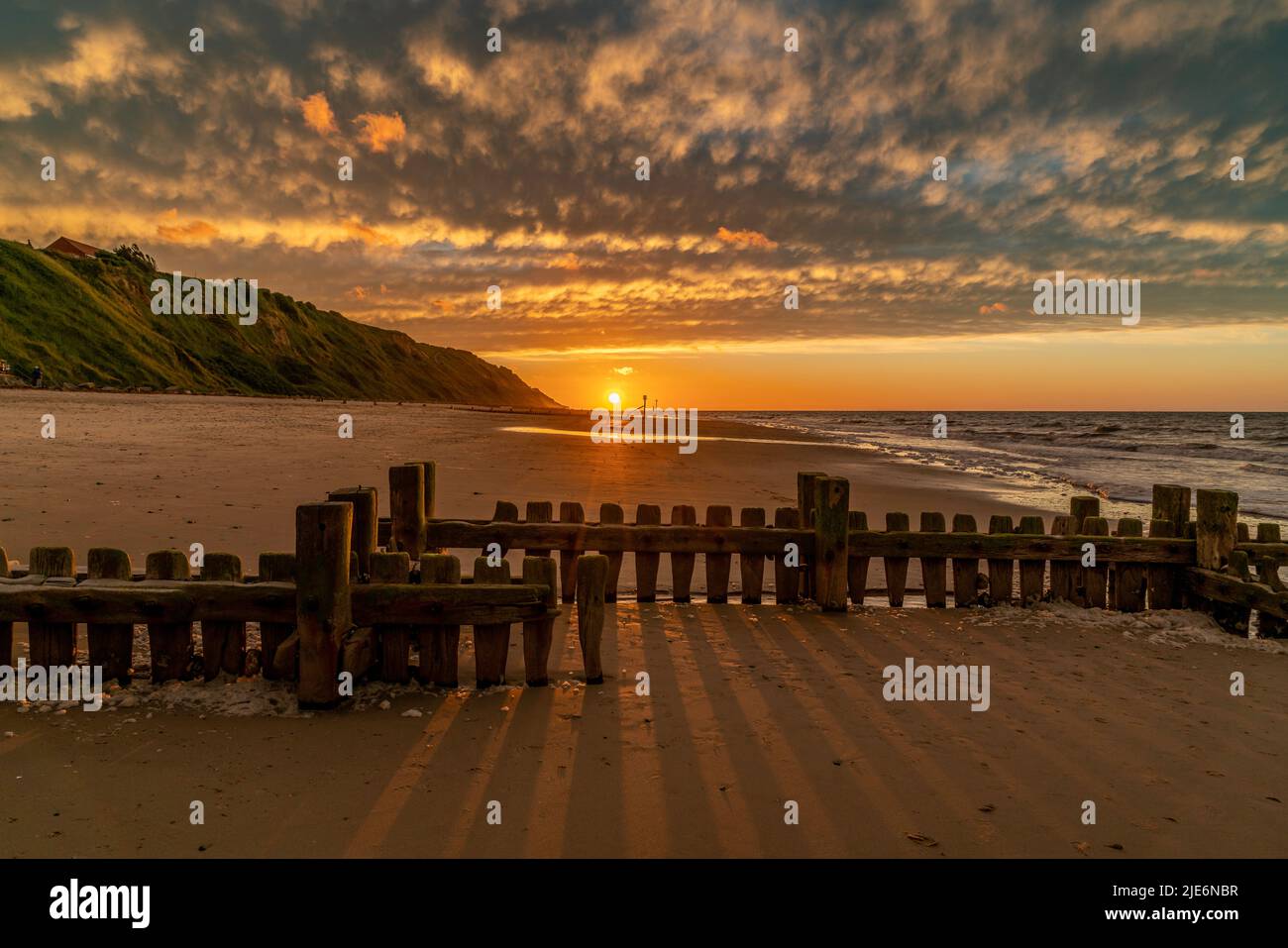 Coucher de soleil sur Mundesley Beach, North Norfolk Banque D'Images