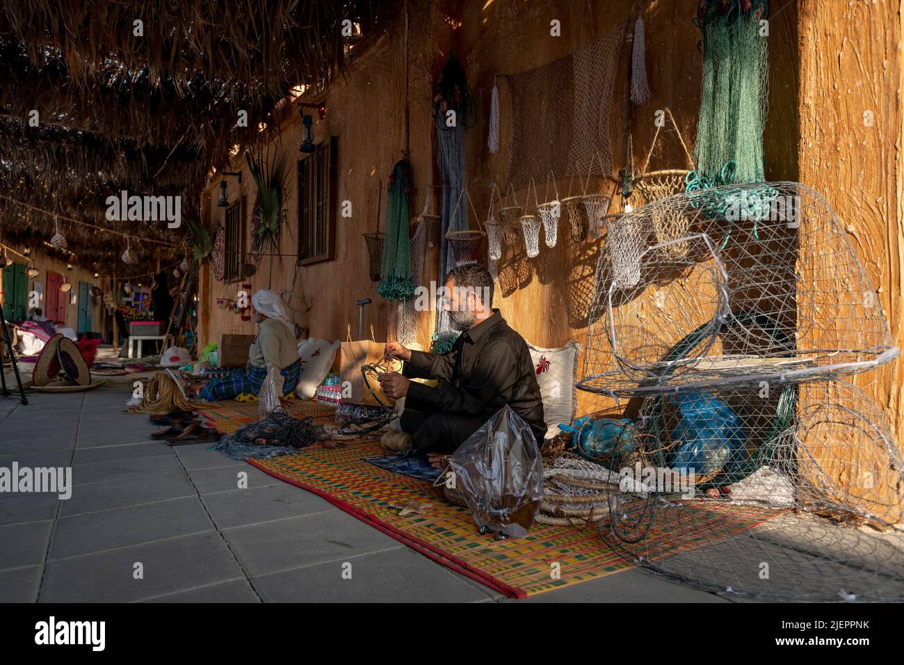 La vie de l'homme de Fisher du golfe Arabo-Persique - festival de dhow arabe Katara Beach Qatar Banque D'Images