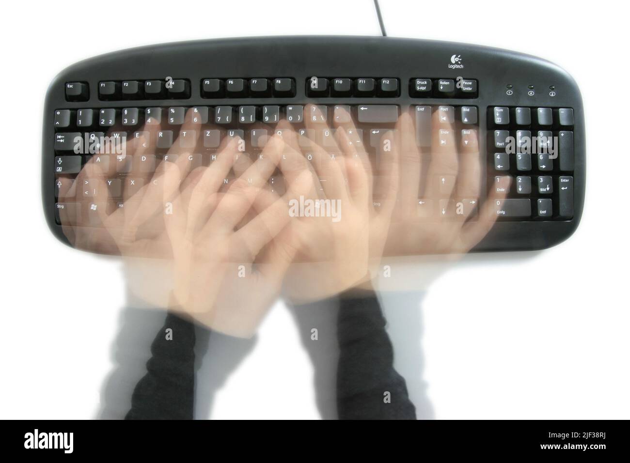 Les mains sur un clavier Banque D'Images