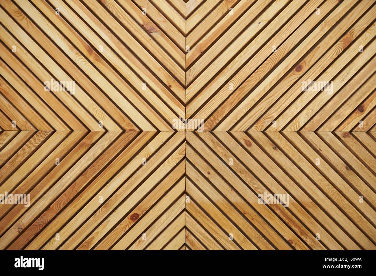 Arrière-plan d'un mur en bois fait de lattes. Banque D'Images