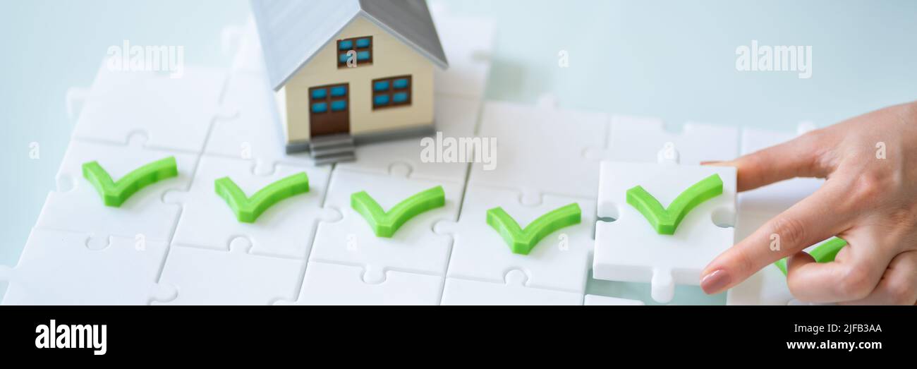 Liste de contrôle pour l'achat et l'évaluation de maisons immobilières Banque D'Images