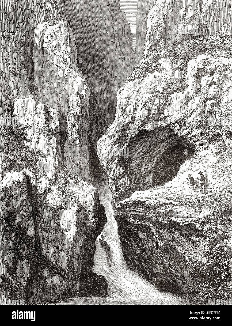 Grotte et cascade d'Edelfraugrab, ou tombe de la Noble Dame, Forêt Noire, État du Bade-Wurtemberg, Allemagne. Europe. Voyage dans la Forêt Noire par Alfred Michiels 1867 au départ du Tour du monde 1867 Banque D'Images