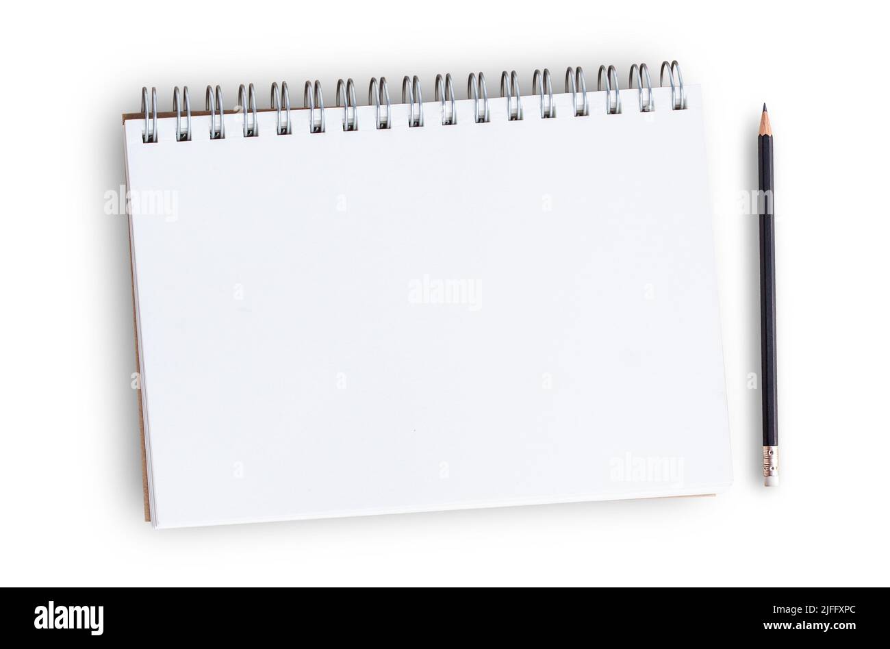Bloc-notes ou bloc-notes avec crayon sur la table blanche background.using papier peint pour l'éducation, la photo d'entreprise.Prenez note du produit pour le livre avec papier a Banque D'Images
