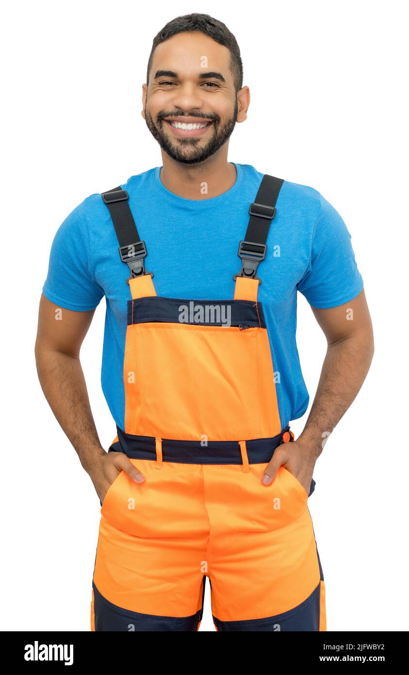 Riant ouvrier de construction hispanique avec l'équipement de protection orange isolé sur fond blanc pour la découpe Banque D'Images