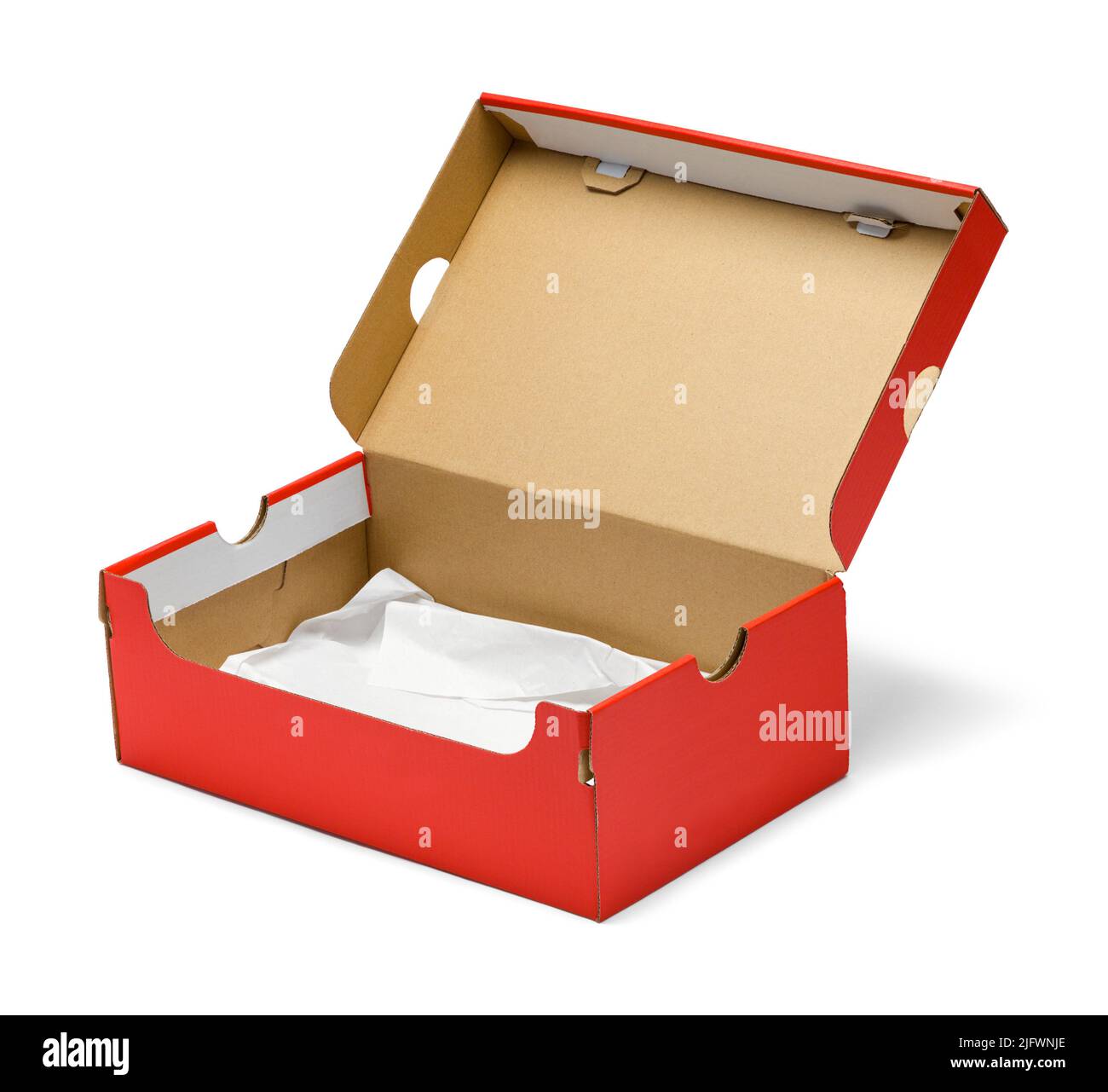 Boîte à chaussures ouverte rouge ajourée sur blanc. Banque D'Images