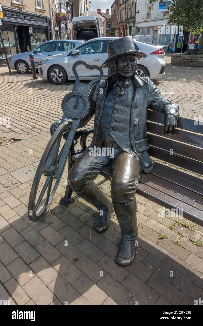 « Blind Jack » (John Metcalf, ingénieur civil pionnier 1717-1810) sculpture assise sur un banc à Knaresborough, dans le North Yorkshire, au Royaume-Uni. Banque D'Images