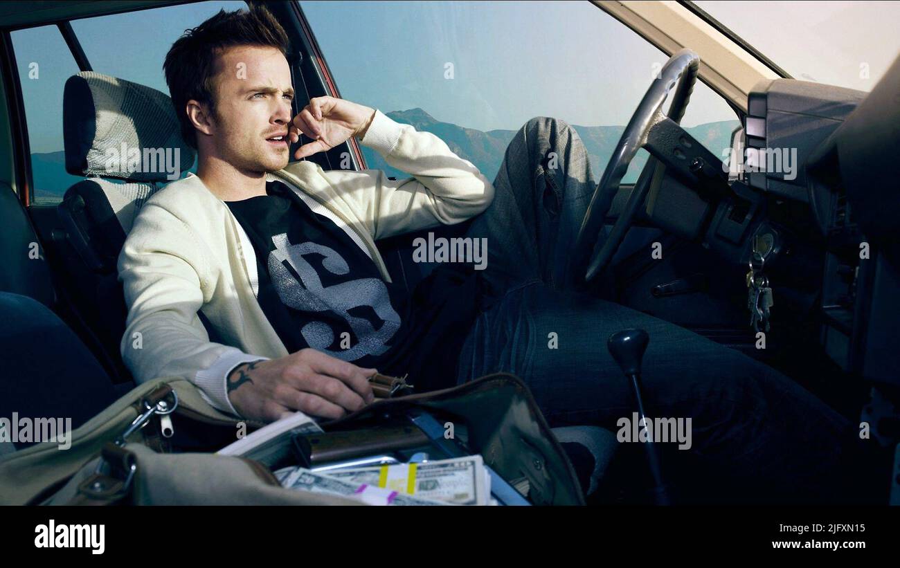 AARON PAUL, BESOIN DE VITESSE, 2014 Banque D'Images