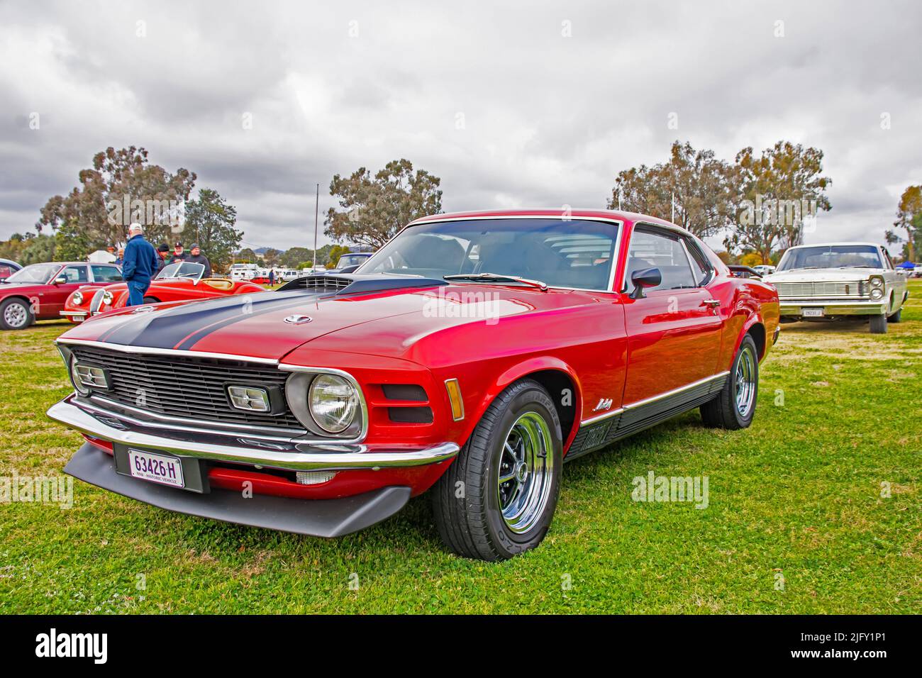 ▷ Tableau vintage d'une Mustang rouge