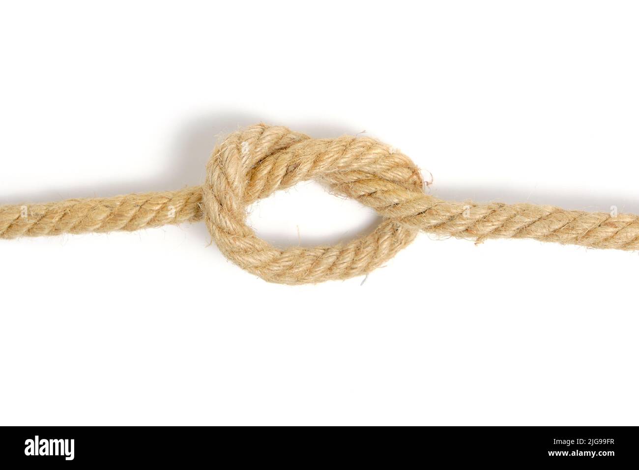 Corde nouée dans un nœud, fond blanc Banque D'Images