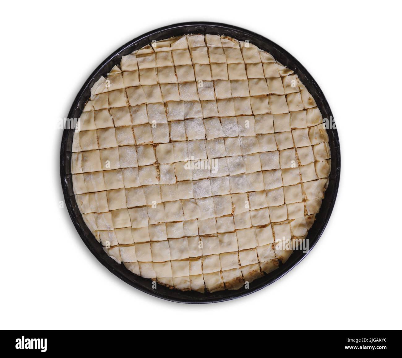 Baklava maison avec noix sur fond blanc, recette traditionnelle turque de style ancien, pâtisserie Banque D'Images