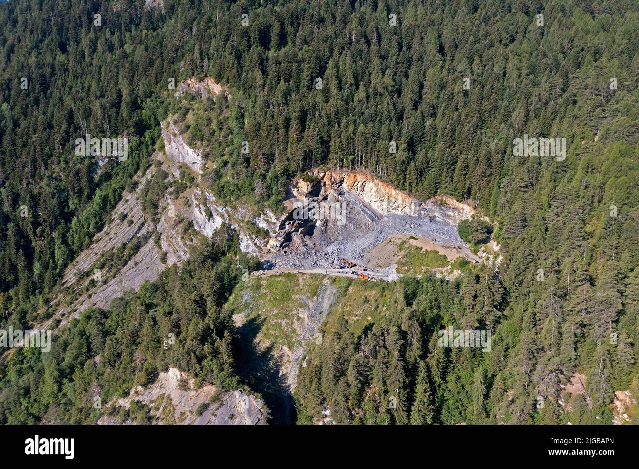 Carrière dans une forêt, carrière de granit Dugny, Leytron, Valais, Suisse Banque D'Images