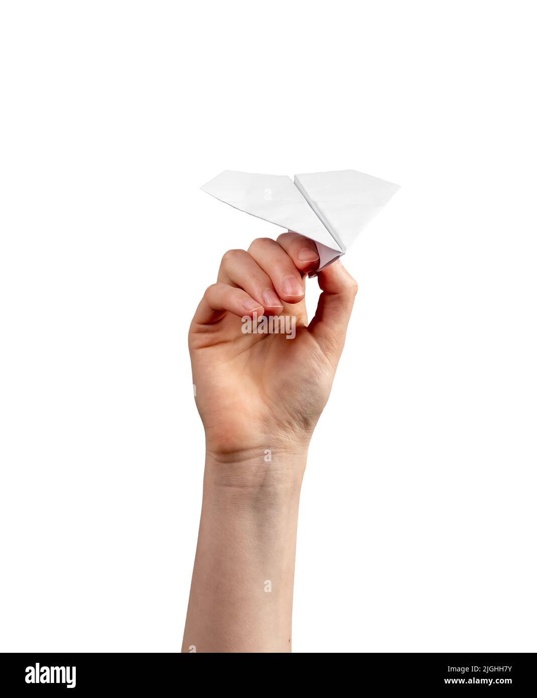 Une femme jette un avion d'origami isolé sur fond blanc. Construction en papier volant fait main. Photo de haute qualité Banque D'Images