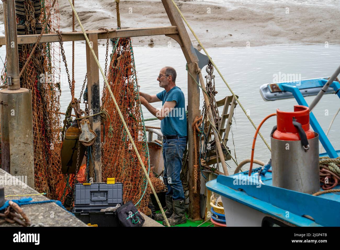Réparer les filets de pêche Banque de photographies et d’images à haute résolution Alamy