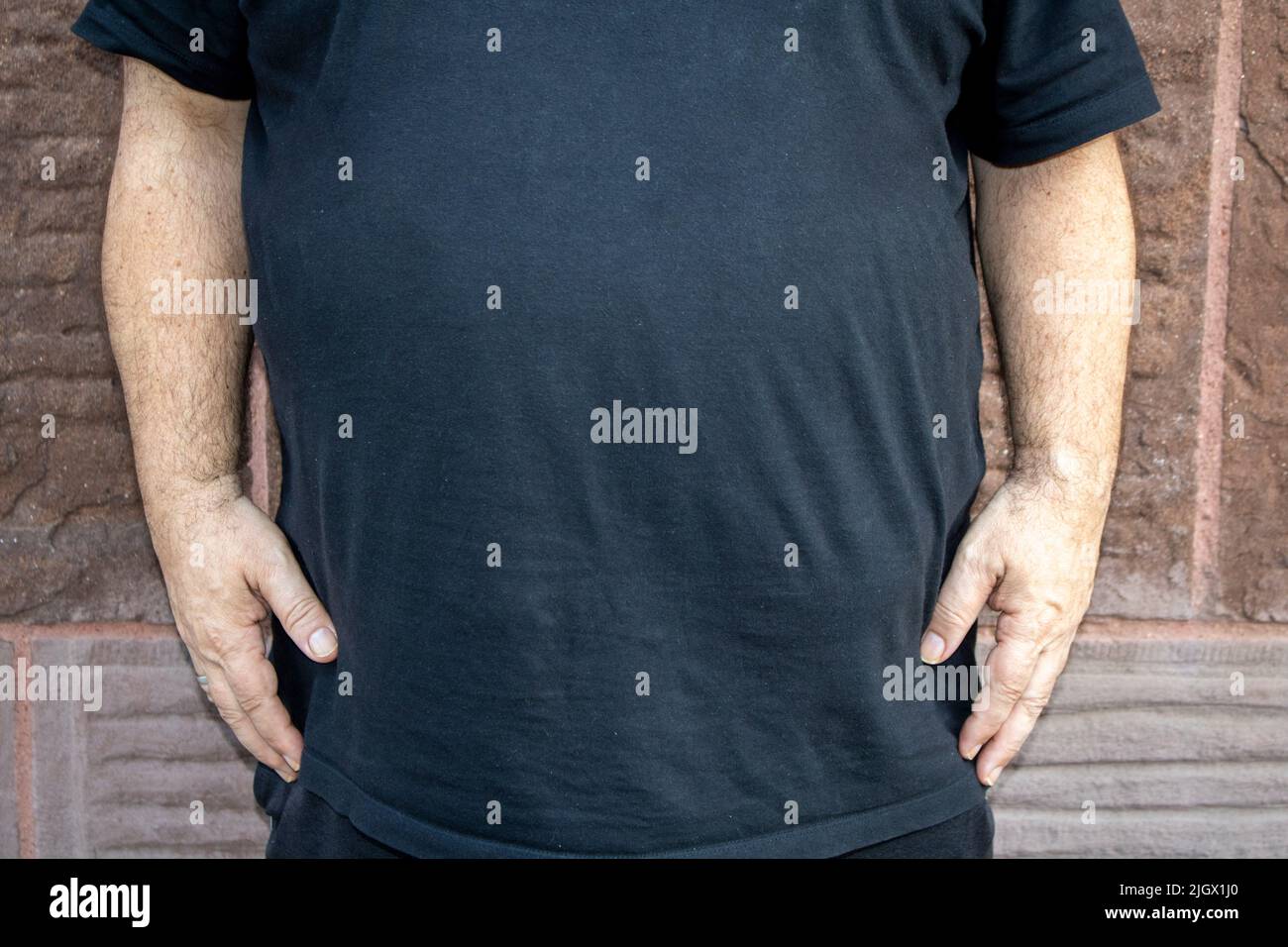 Graisse du ventre l'obésité abdominale est le signe le plus clair du risque de diabète de type 2 gros ventre gras homme Banque D'Images