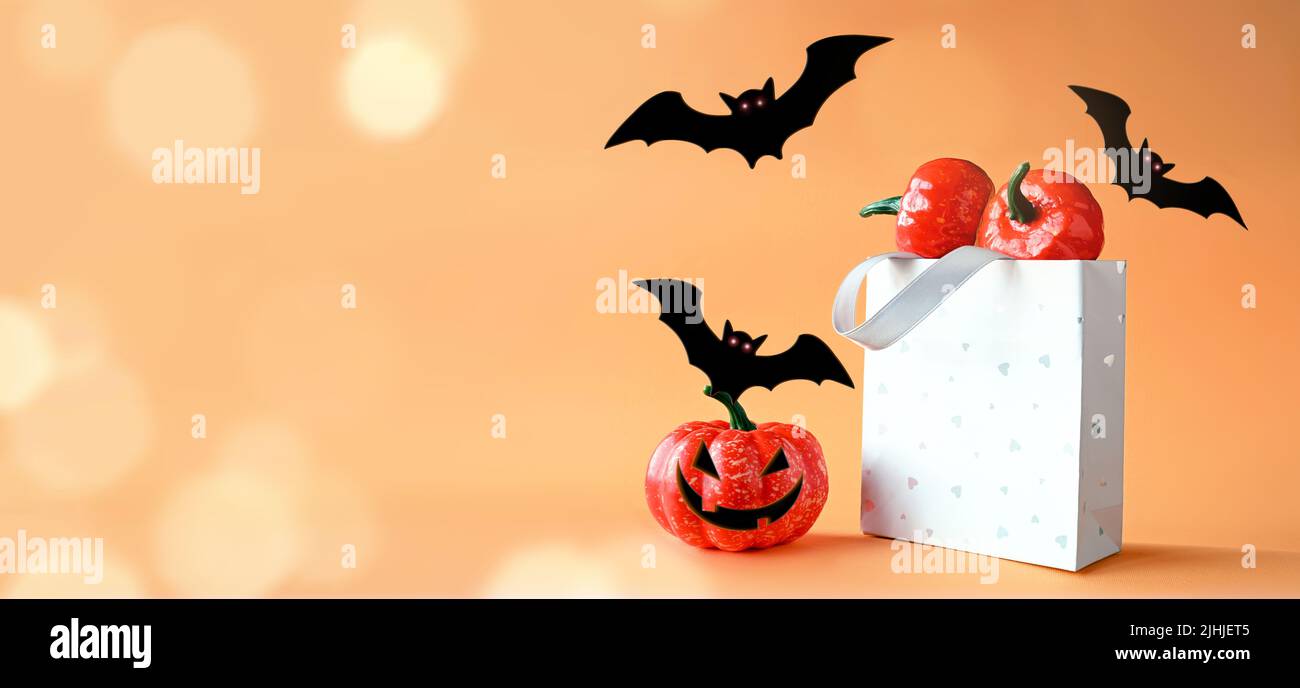Citrouilles d'Halloween, chauves-souris et sac à provisions. Joyeux halloween concept. Banque D'Images