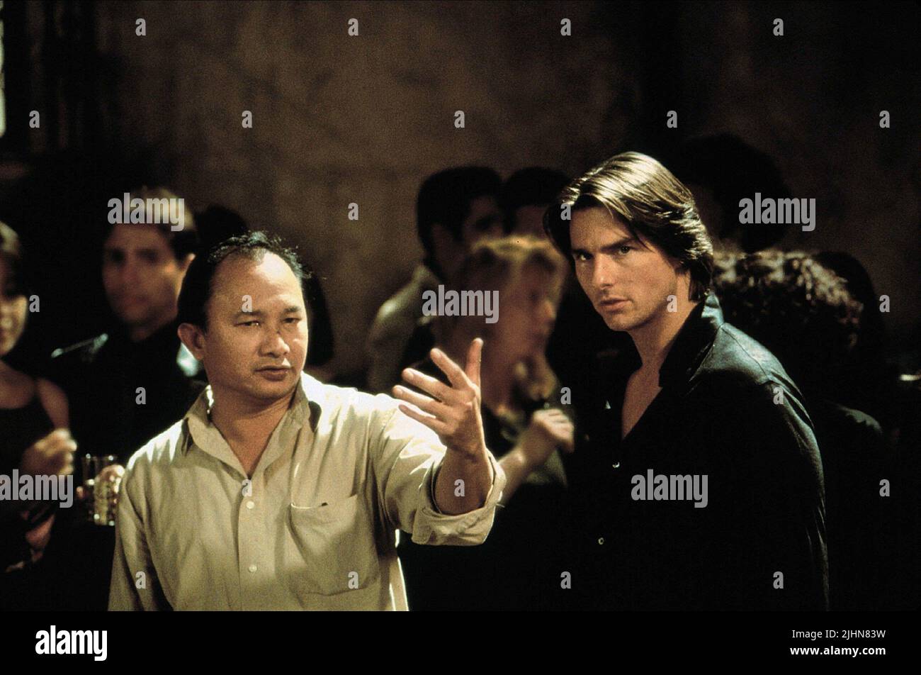 JOHN WOO, TOM CRUISE, MISSION : IMPOSSIBLE II, 2000 Banque D'Images