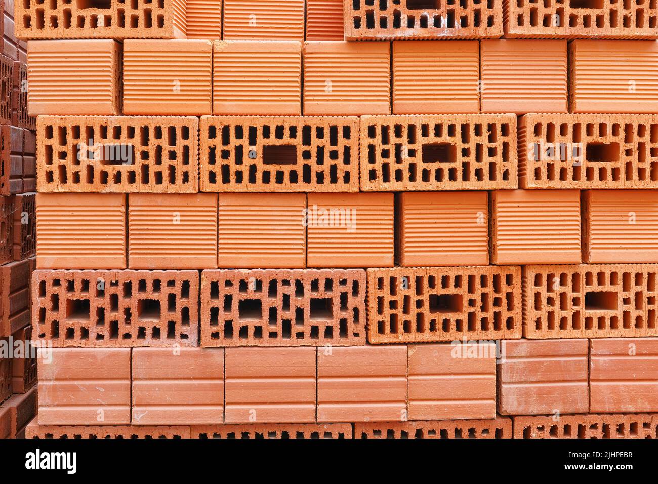 Briques De Céramique Rouge Sur Le Chantier. Keramoblock. Brique Creuse.  Construction D'un Bâtiment En Briques Rouges. Closeup. Mat Image stock -  Image du orange, industriel: 257006949