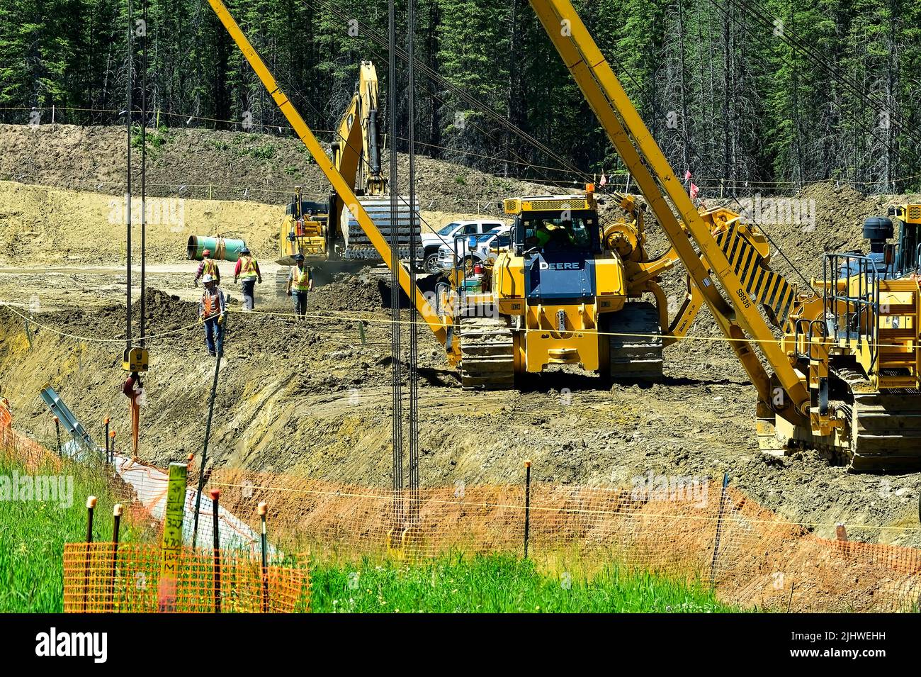 Installation du tuyau pour le pipeline Transmountain dans les régions rurales de l'Alberta au Canada. Banque D'Images