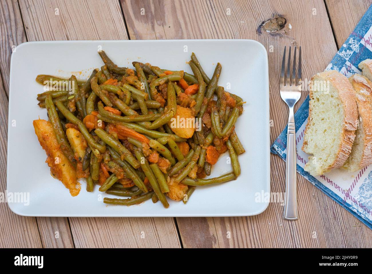 Cuisine grecque . Haricots verts dans l'huile d'olive, en Grèce fasolakia ladera Banque D'Images