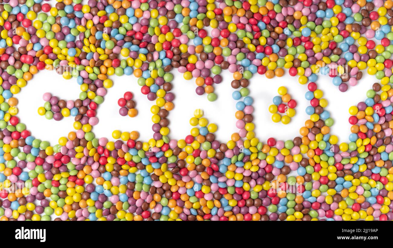 Bonbons colorés en bonbons texte Banque D'Images