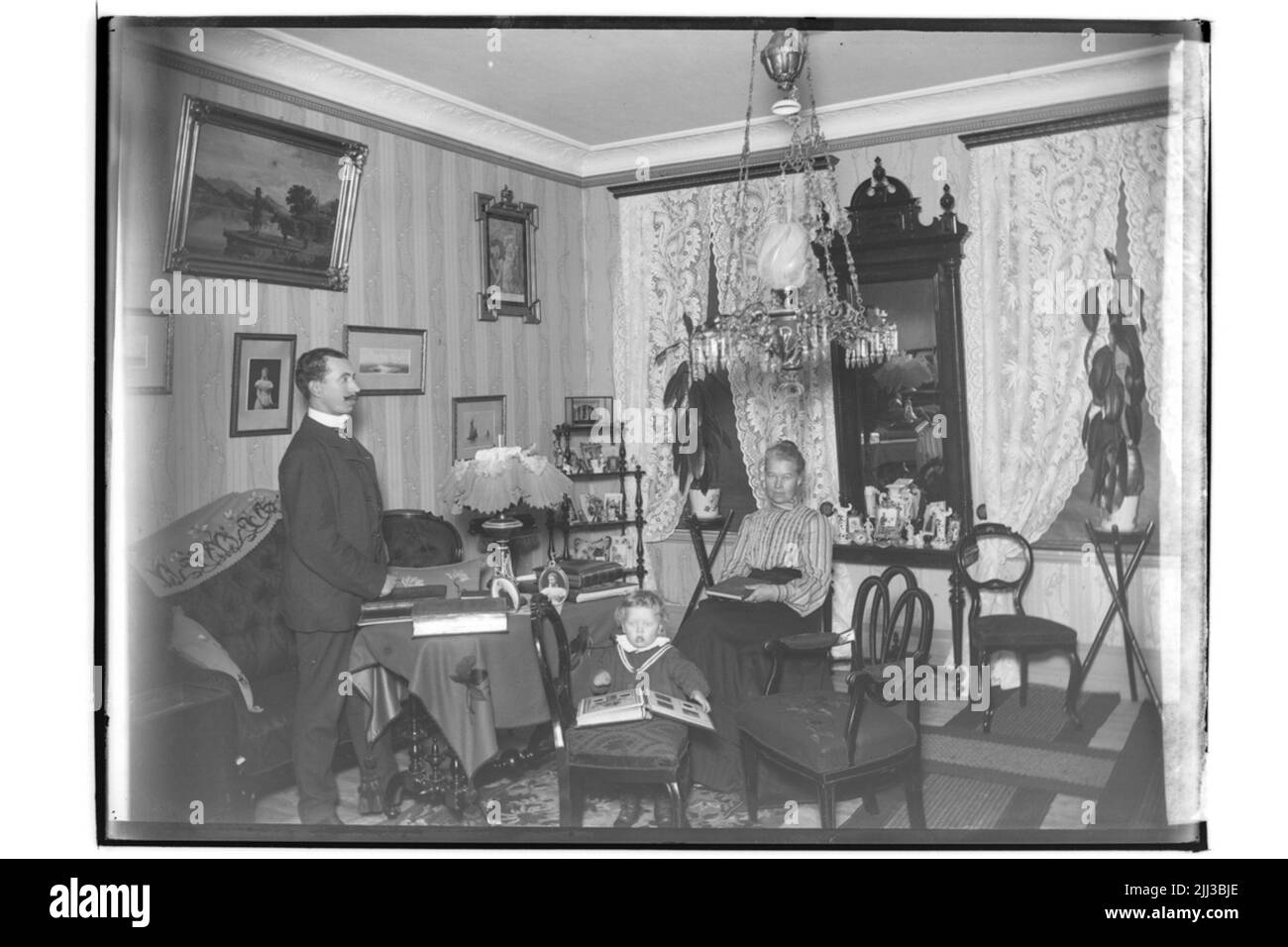 Chambre intérieure, 3 personnes. Barber K.D. Rundvall Banque D'Images