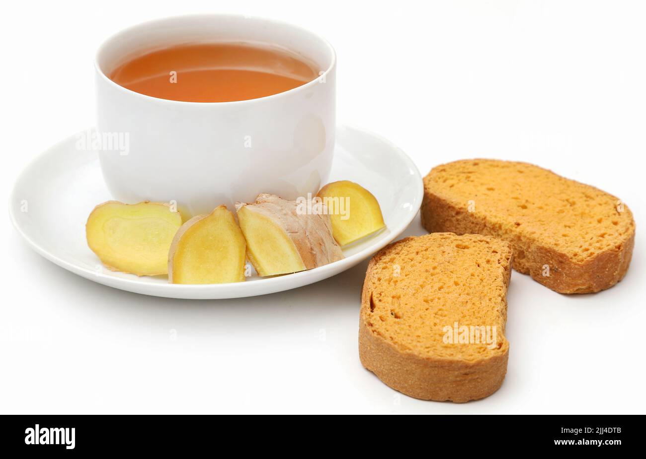 Tisane avec différentes herbes et ingrédients et toast comme petit déjeuner Banque D'Images