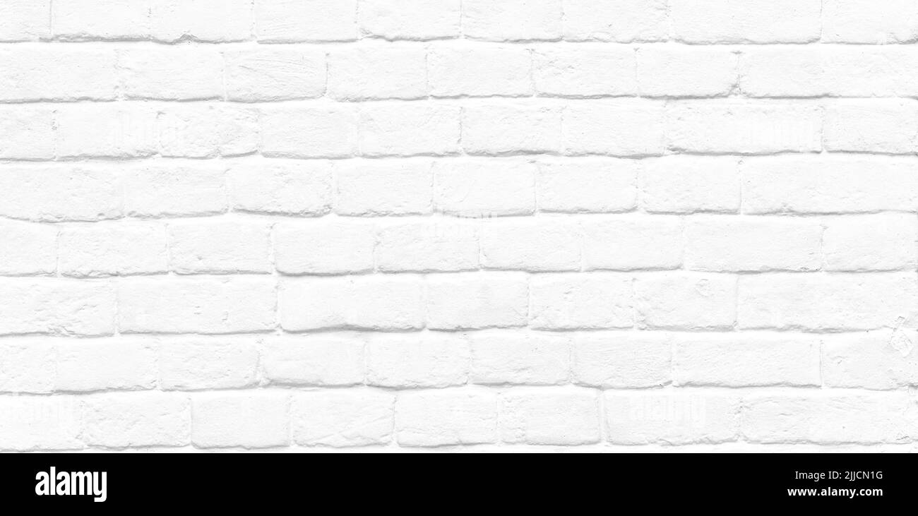 Longue image avec des briques de pierre rondes blanches, vieux mur de brique vintage comme texture ou fond Banque D'Images