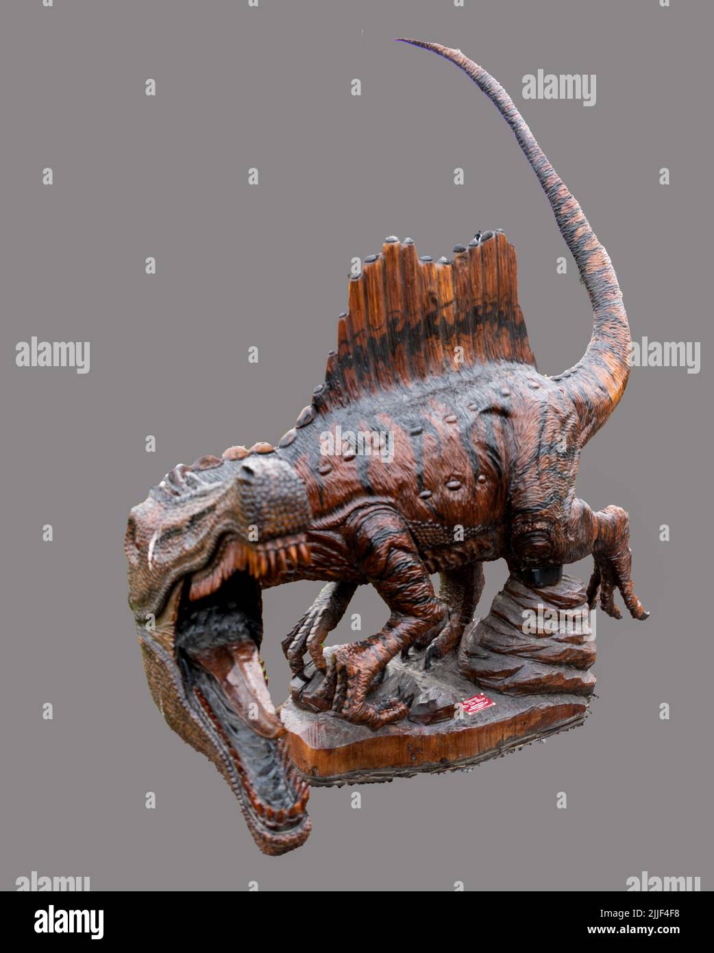 Ce Dinosaur Carving est l'une des nombreuses sculptures en bois de Chainsaw du Championnat international de sculpture Chetwynd Chainsaw annuel à Chetwynd, en Colombie-Britannique Banque D'Images