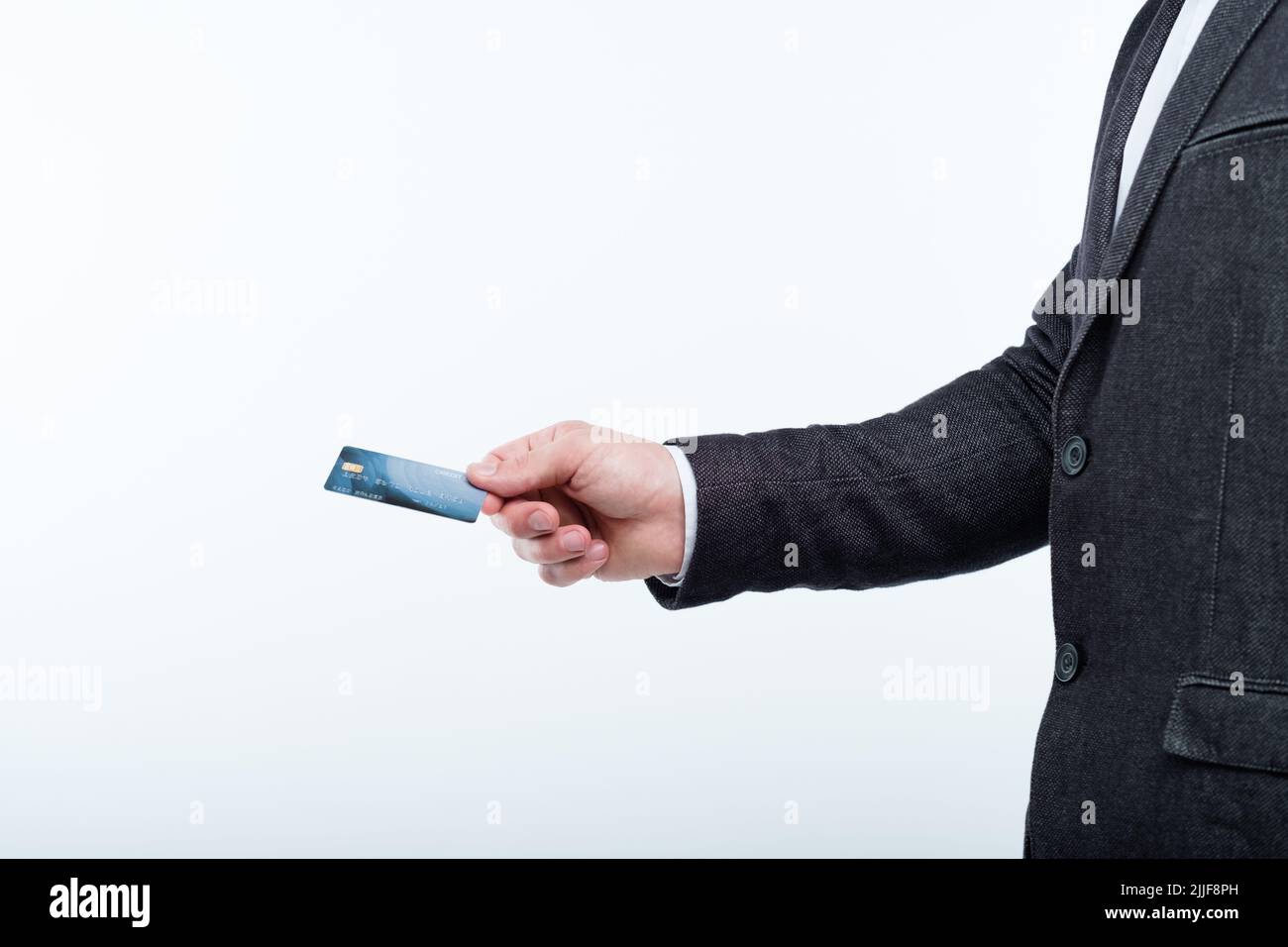 transactions électroniques argent homme garde carte de crédit Banque D'Images