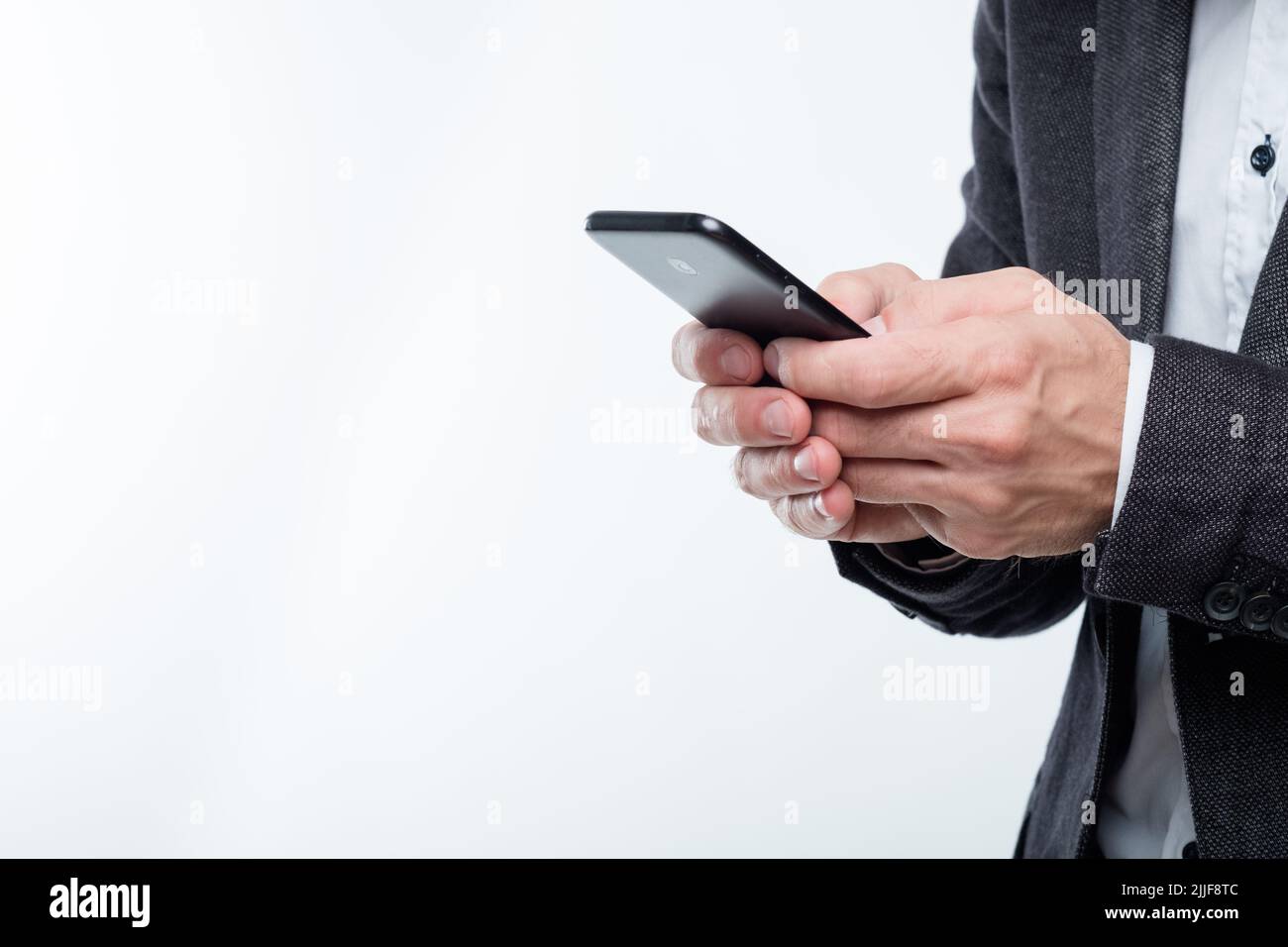 homme mains téléphone portable technologie communication Banque D'Images