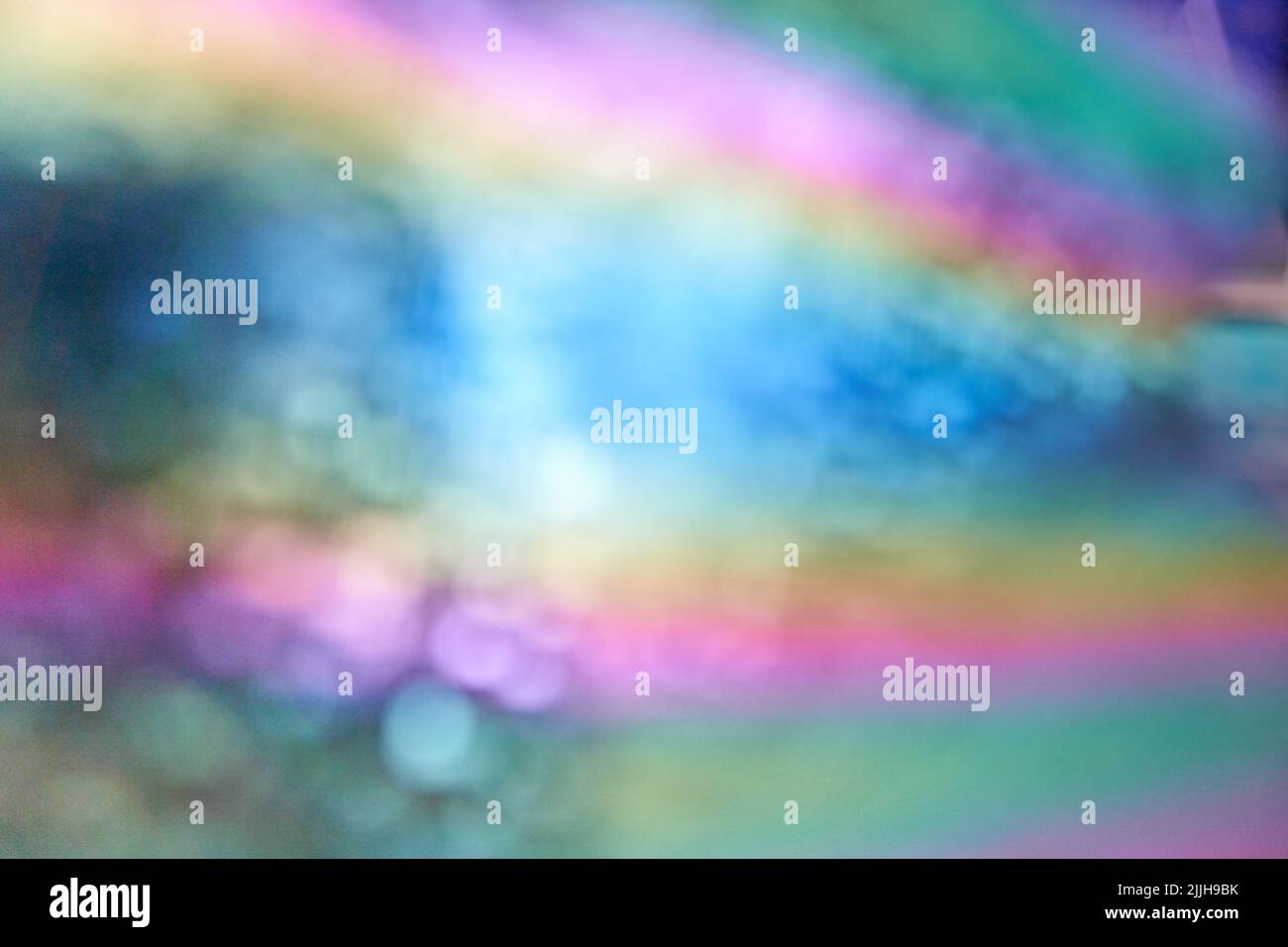 Couleur arc-en-ciel holographique floue. Motif abstrait de texture holographique brillante pour le dessin et l'arrière-plan. Style minimaliste. Photo de haute qualité Banque D'Images