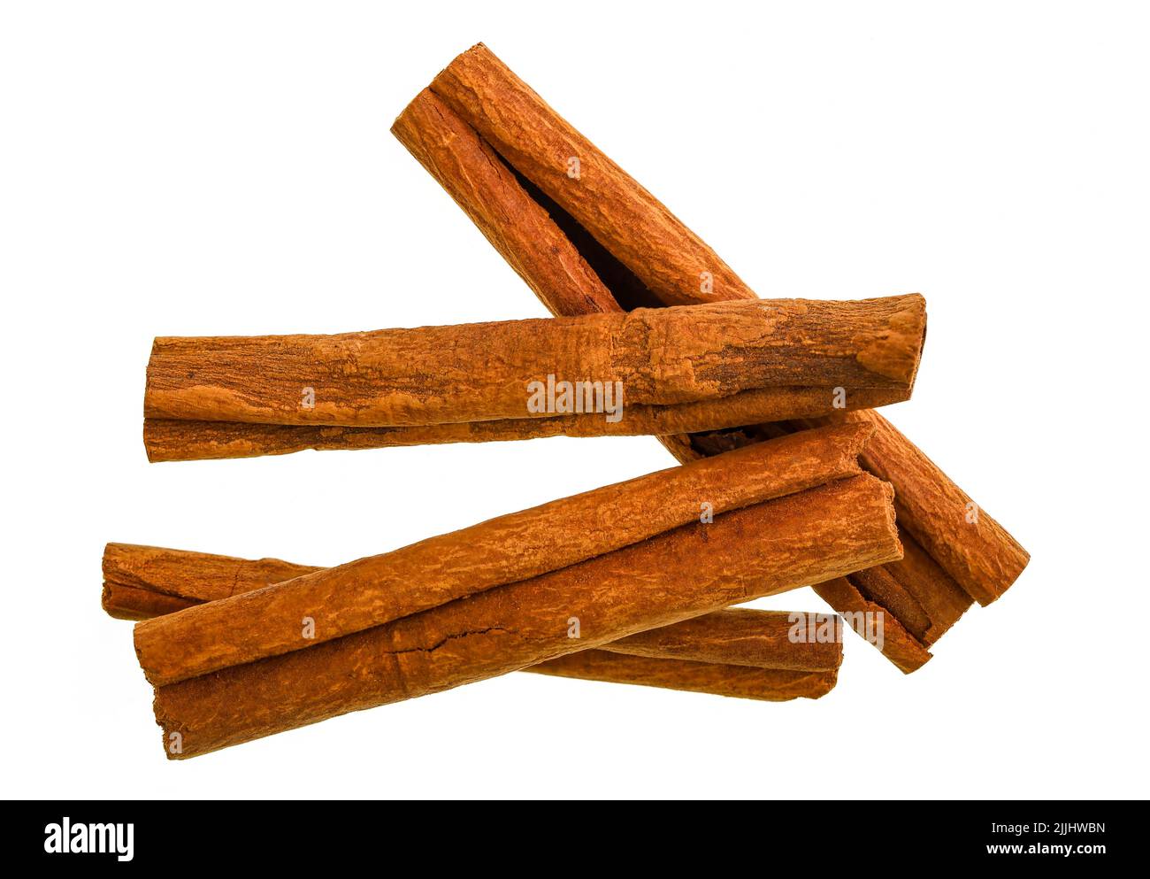 La cannelle est une épice faite à partir de l'écorce intérieure des arbres scientifiquement connue sous le nom de Cinnamomum les bâtons de cannelle sont les bandes d'écorce intérieure roulées qui se courbent Banque D'Images