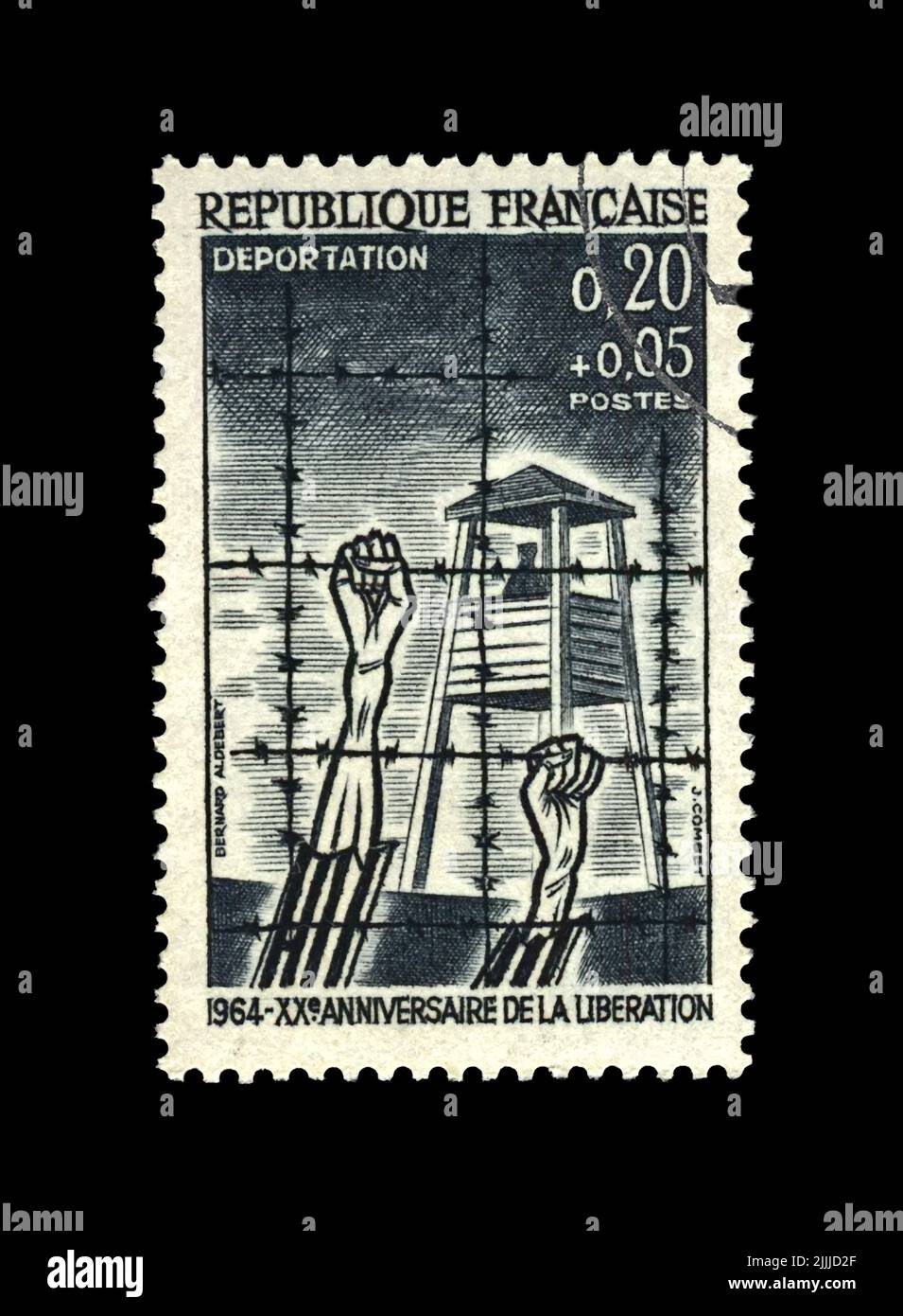 Libération du camp de concentration, victimes mains humaines sous câble barbelé, 20th anniversaire, VERS 1964. Timbre de poste d'époque imprimé en FRANCE. Banque D'Images