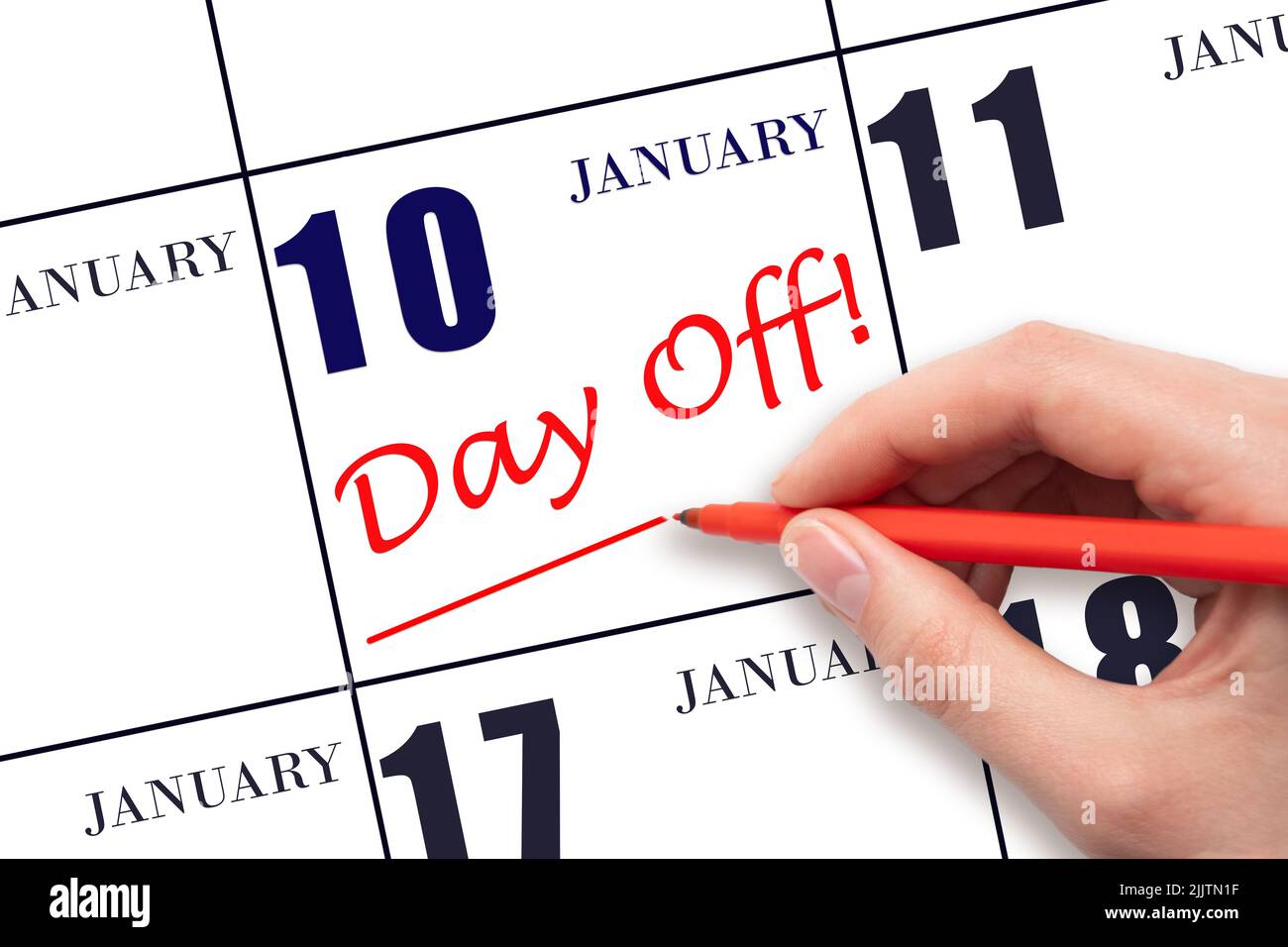 10th jour de janvier. Écrire du texte à la main LE JOUR de la journée et dessiner une ligne à la date du calendrier le 10 janvier. Concept de planification des vacances. Mois d'hiver, jour du yea Banque D'Images