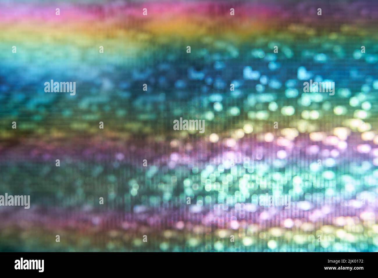 Couleur arc-en-ciel holographique floue. Motif abstrait de texture holographique brillante pour le dessin et l'arrière-plan. Style minimaliste. Photo de haute qualité Banque D'Images