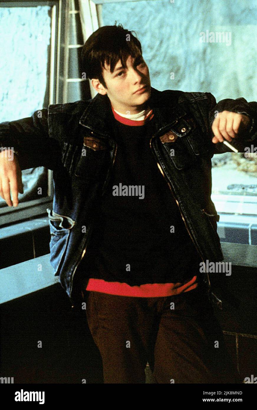 Edward Furlong film Little Odessa (1994) personnages : Reuben Shapira réalisateur : James Gray 02 septembre 1994 **AVERTISSEMENT** cette photographie est à usage éditorial seulement et est la propriété de NEW LINE et/ou du photographe désigné par la société de production et ne peut être reproduite que par des publications en liaison avec la promotion du film ci-dessus. Un crédit obligatoire pour LA NOUVELLE LIGNE est requis. Le photographe doit également être crédité lorsqu'il est connu. Aucune utilisation commerciale ne peut être accordée sans autorisation écrite de The film Company. Banque D'Images