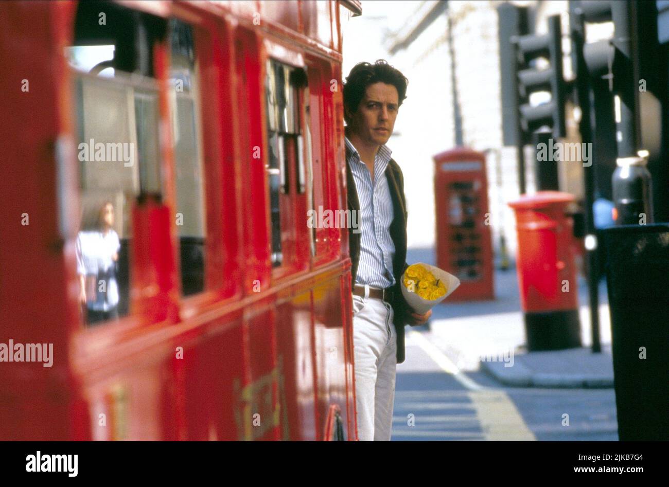 Hugh Grant film: Notting Hill (UK/USA 1999) personnages: William Thacker Directeur: Roger Michell 13 mai 1999 **AVERTISSEMENT** cette photographie est à usage éditorial exclusif et est le droit d'auteur de POLYGRAM FILM FILMÉ ENTERTAINMENT et/ou le photographe assigné par la Société du film ou de la production et ne peut être reproduite que par des publications dans le cadre de la promotion du film ci-dessus. Un crédit obligatoire pour LE DIVERTISSEMENT FILMÉ PAR POLYGRAM est requis. Le photographe doit également être crédité lorsqu'il est connu. Aucune utilisation commerciale ne peut être accordée sans l'autorisation écrite de la Société du film. Banque D'Images