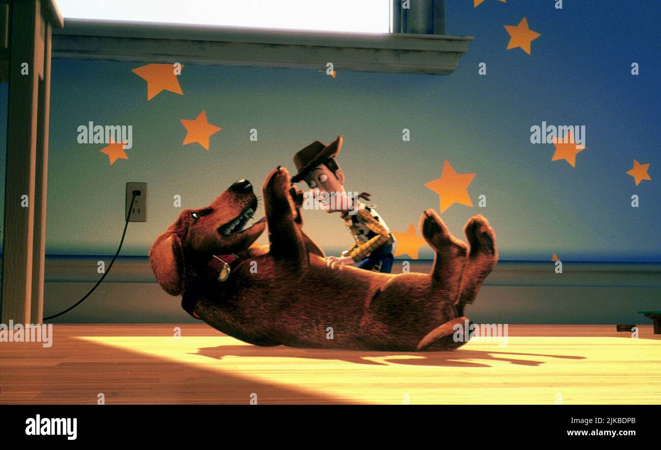 Woody & Buster The Dog film: Toy Story 2 (USA 1999) personnages: Woody & Regie: John Lasseter, Ash Brannon & Lee Unkrich, Directeur: John Lasseter 13 novembre 1999 **AVERTISSEMENT** cette photographie est destinée à un usage éditorial exclusif et est protégée par les droits d'auteur de PIXARDISNEY et/ou du photographe attribué par la Société de film ou de production et ne peut être reproduite que par des publications dans le cadre de la promotion du film ci-dessus. Un crédit obligatoire pour PIXARDISNEY est requis. Le photographe doit également être crédité lorsqu'il est connu. Aucune utilisation commerciale ne peut être accordée sans l'autorisation écrite de la Société du film Banque D'Images