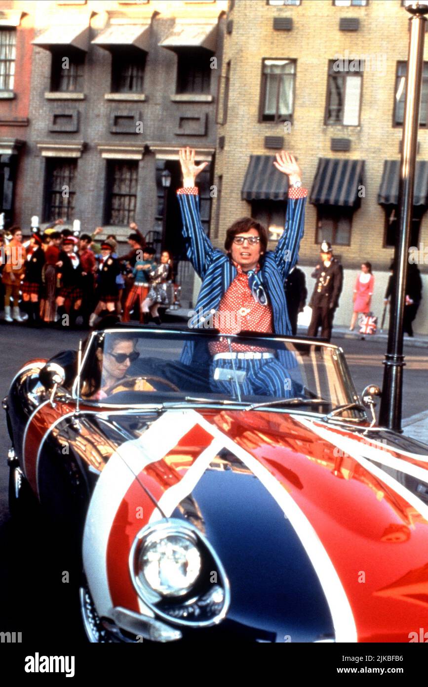 Mike Myers film: Austin Powers: The Spy When Sharged Me; Austin Powers 2 (USA 1999) personnages: Austin Powers / Jaguar E-Type Director: Jay Roach 08 juin 1999 **AVERTISSEMENT** cette photographie est à usage éditorial exclusif et est le droit d'auteur d'UN NOUVEAU CINÉMA DE LIGNE et/ou du photographe assigné par la Société de film ou de production et ne peut être reproduite que par des publications dans le cadre de la promotion du film ci-dessus. Un crédit obligatoire pour UNE NOUVELLE LIGNE DE CINÉMA est requis. Le photographe doit également être crédité lorsqu'il est connu. Aucune utilisation commerciale ne peut être accordée sans l'autorisation écrite de film Comla Banque D'Images