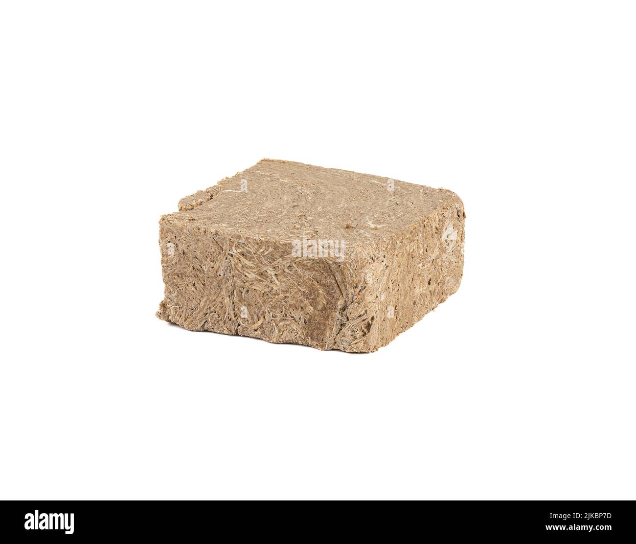 Halva de tournesol à base de graines de tournesol isolées sur fond blanc. Bonbons orientaux. Copier l'espace. Banque D'Images
